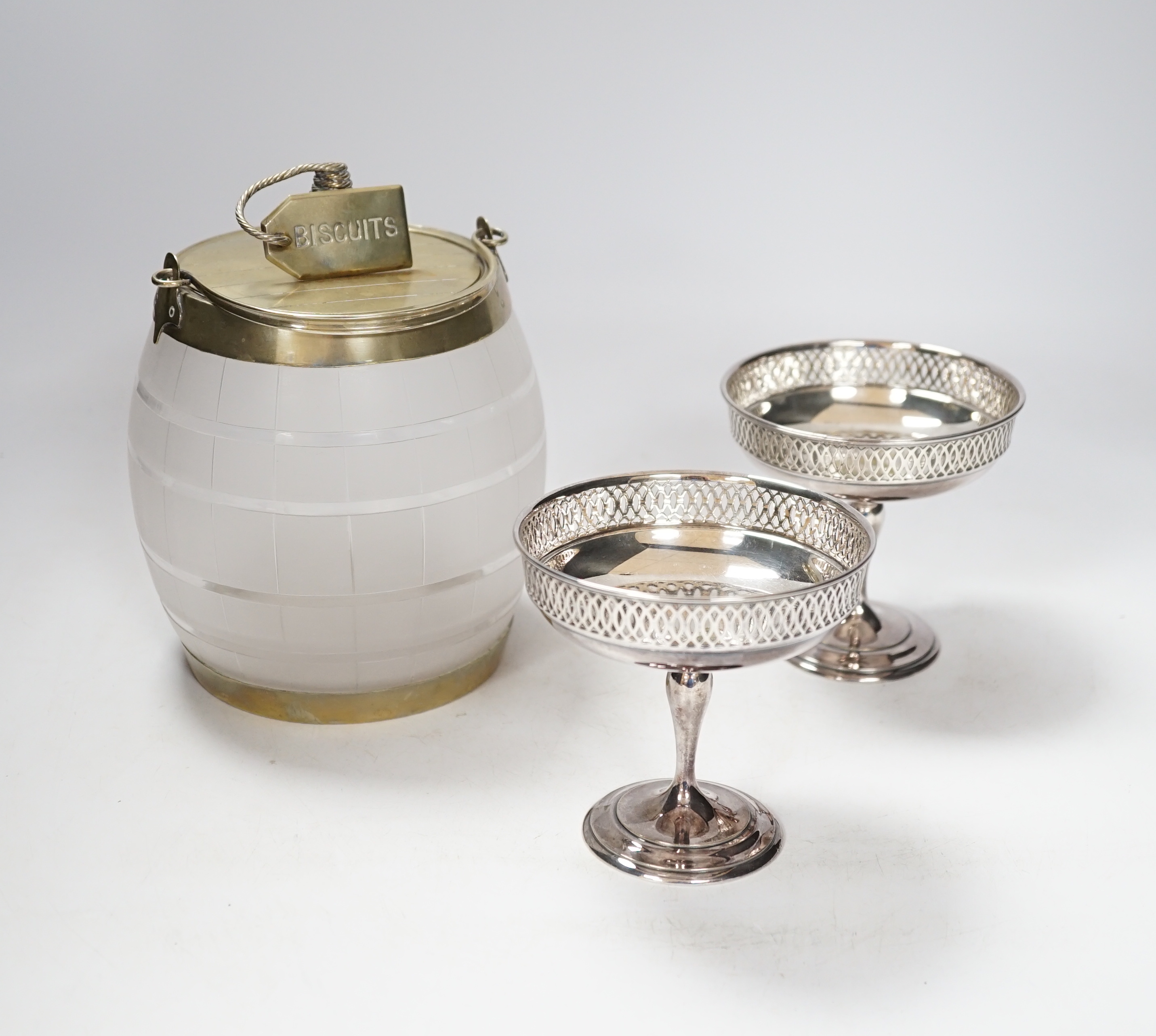 A vintage frosted glass 'BISCUIT' barrel with plated mounts, the cover with 'coiled rope' finial, impressed 'Whiteleys, Westbourne Grove' together with two small sweetmeat tazzas, tallest 17cm